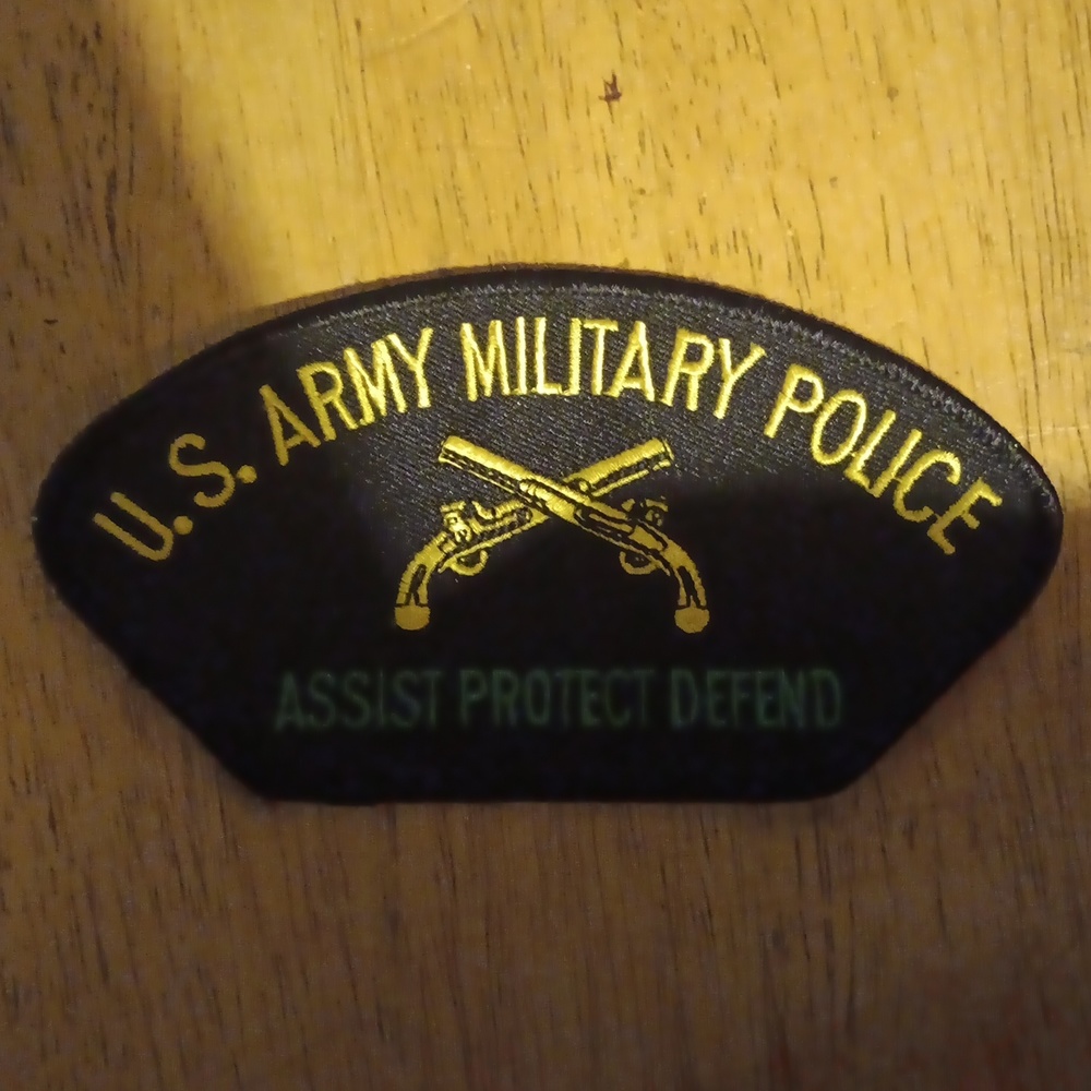 A United States Army military police hat patch that is sew on